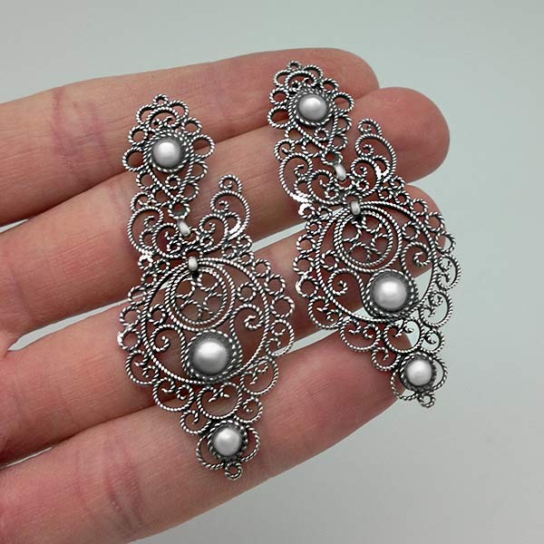 Antique silver earrings with filigree