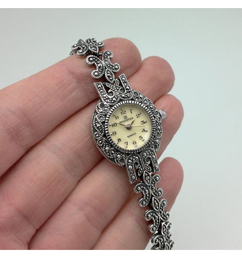 Aged silver watch