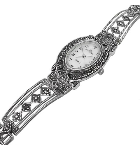 Aged silver watch with oval case