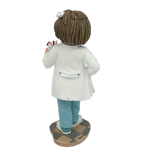 Girl dentist figure, called "my first patient" by Nadal Studio