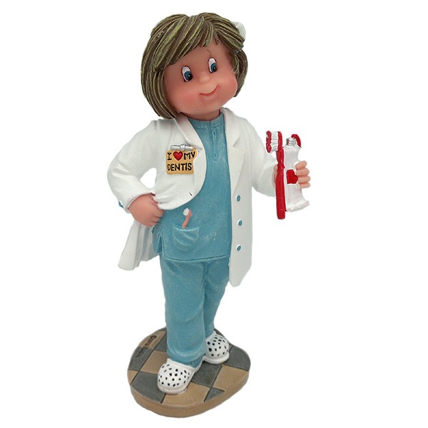 Girl dentist figure, called "my first patient" by Nadal Studio