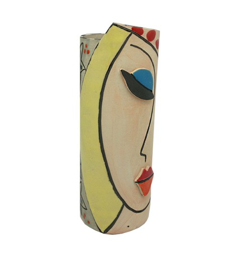Ceramic vase with the face of a woman.