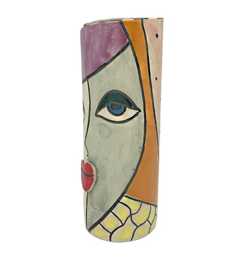 Ceramic vase, in which we can see a woman with a mask.