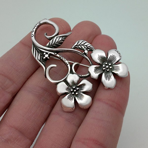 Silver flower brooch