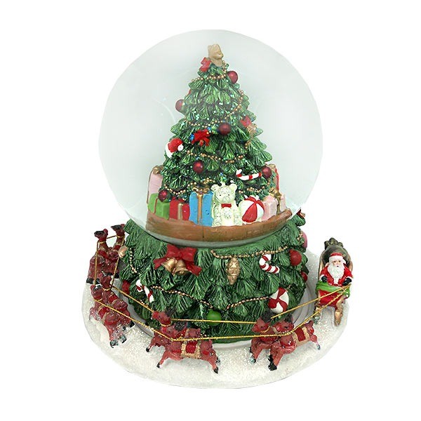 Snow globe with a tree and Santa Claus on his sleigh, spinning around it