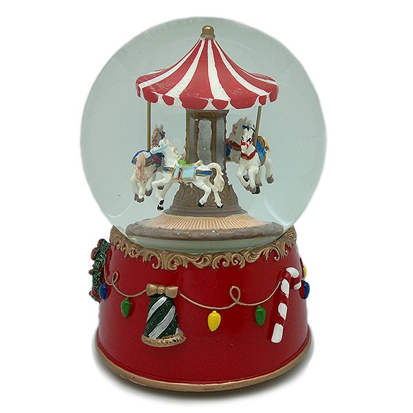Snow globe, with a merry-go-round inside, wind-up operation.