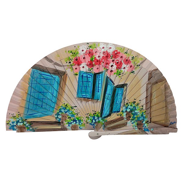 Handmade fan facade with flowers and blue windows