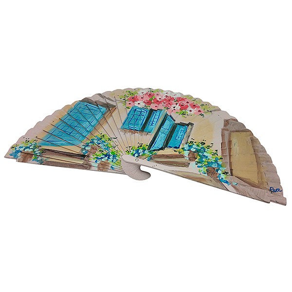 Handmade fan facade with flowers and blue windows
