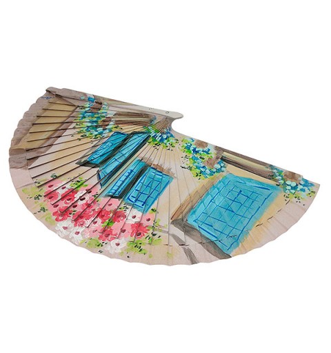 Handmade fan facade with flowers and blue windows