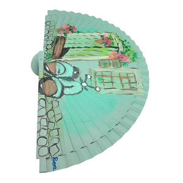 Handcrafted Spanish Classic Motorcycle Fan in Alley with Flowers