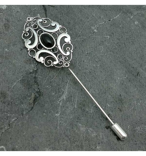 Pin-type brooch, in sterling silver and jet.