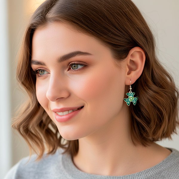 Earrings with a Celtic symbol, called the trinity knot or triple triquetra