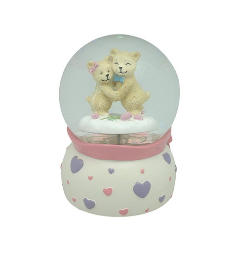 Snow globe with teddy bears, features music and movement