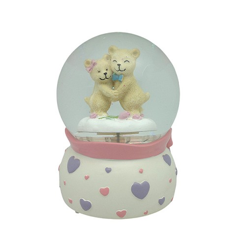Snow globe with teddy bears, features music and movement