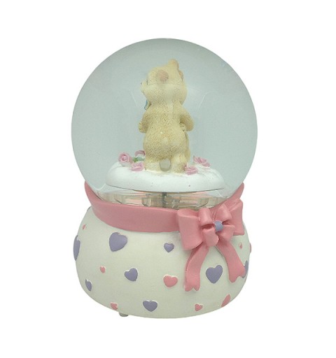 Snow globe with teddy bears, features music and movement