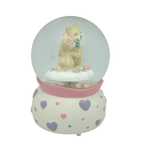 Snow globe with teddy bears, features music and movement
