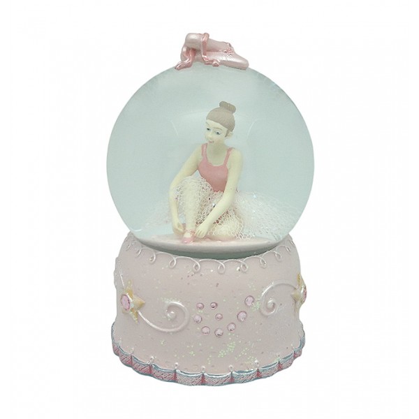 Bola de nieve, en la que podemos ver a una bailarina, ajustando sus zapatillas de punta.
