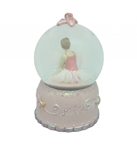 Snow globe, in which we can see a ballerina adjusting her pointe shoes.