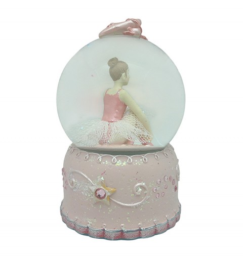 Bola de nieve, en la que podemos ver a una bailarina, ajustando sus zapatillas de punta.