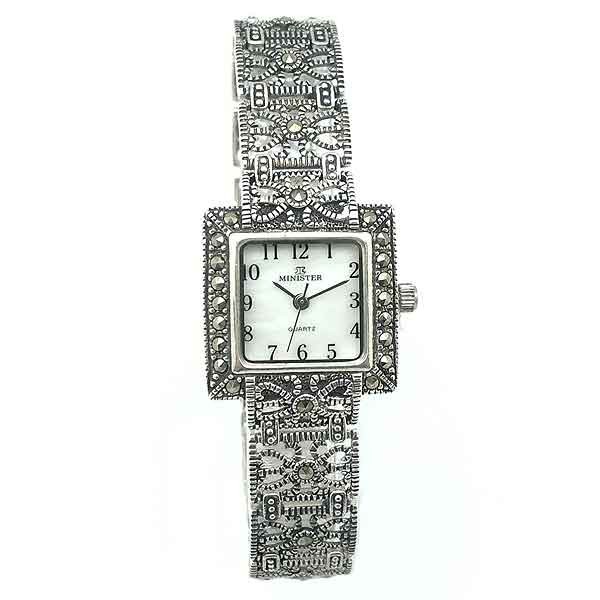 Clock lady in silver.