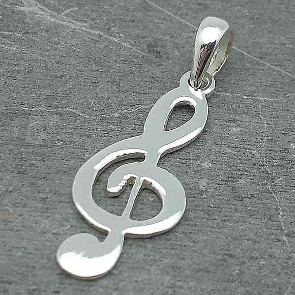 Treble clef pendant, in silver.